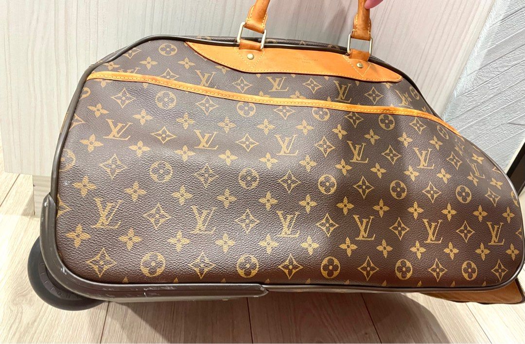 Louis vuitton rolling duffle hot sale bag