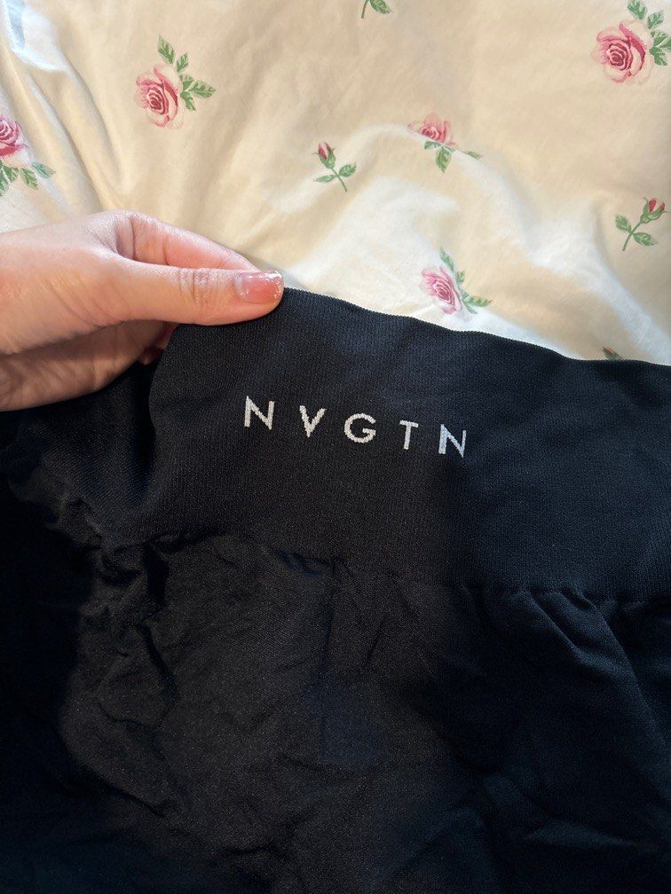 100 REAL NVGTN workout shorts with tight waist band size M