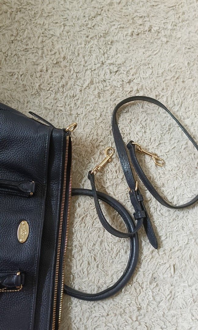 Original Coach sling/shoulder bag/handbag (Category: Luxury Bags & Wallets) located in Mendez-Nunez. Submitted by d.mendeja (Listing ID 1282518247, Image 2). Description: navy blue/dark blue original coach 3-way, with 3 compartments plus 2 inner pockets, no issue, all hardware light gold- no fade, almost new, shipping fee must be shouldered by the buyer.