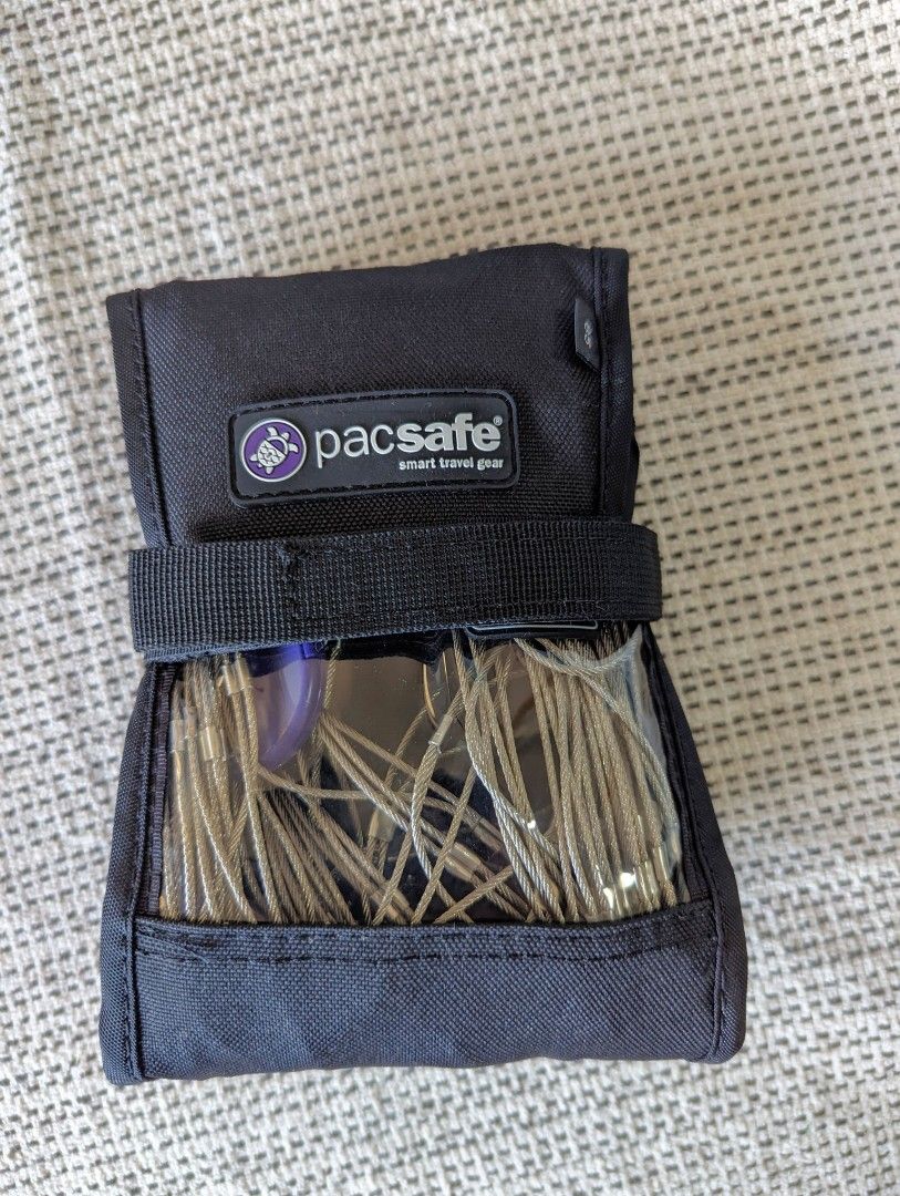 Unused Pacsafe 85l exomesh Anti theft backpack and bag protector