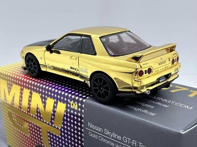 In Stock] Mini GT Tokyo Auto Salon 2024 Nissan Skyline GT-R [R32] Gold  chrome w/ carbon fiber hood, Hobbies & Toys, Toys & Games on Carousell