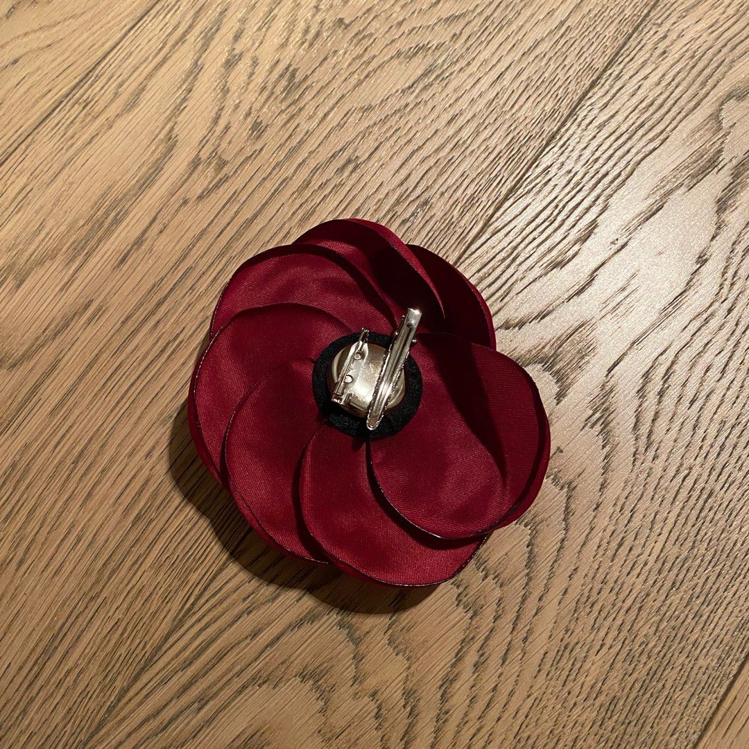 Red brooch outlet