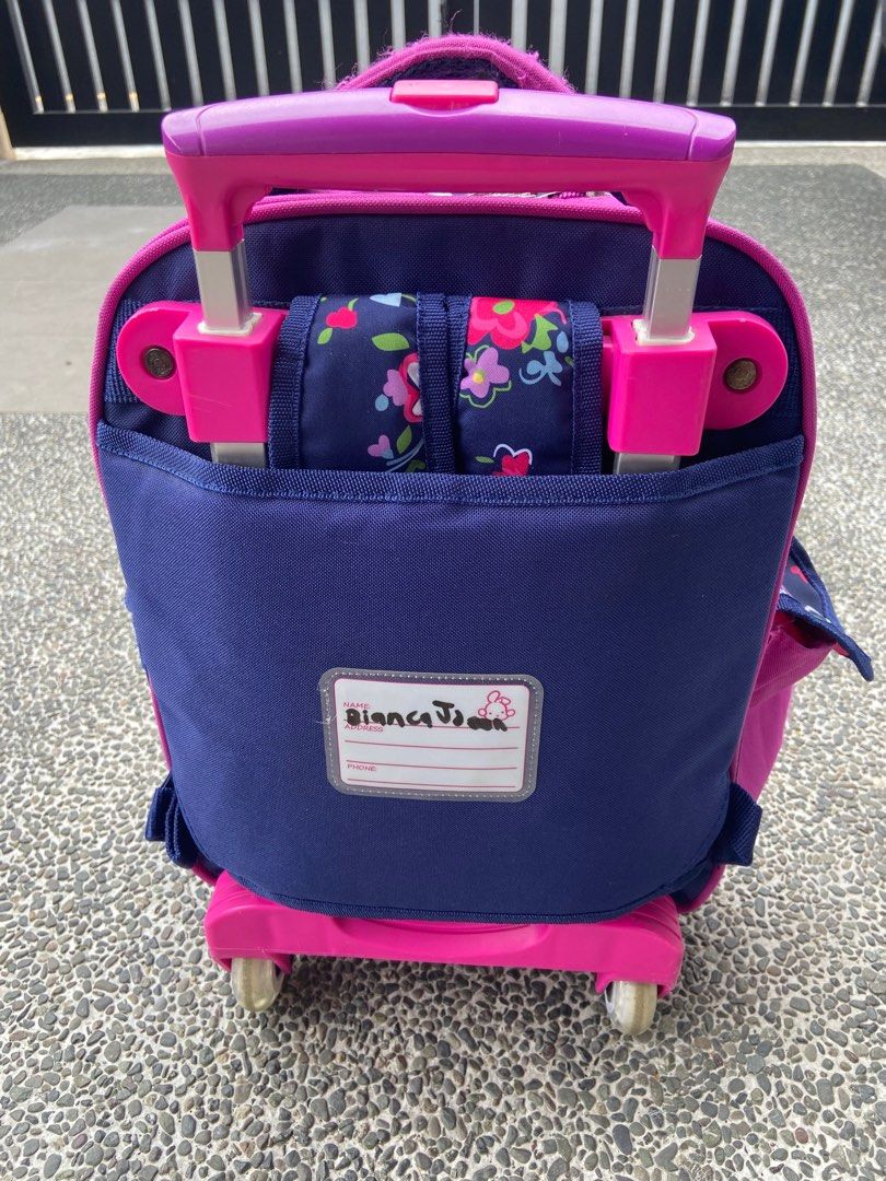 Robby Rabbit Trolly Bag (pink/purple) (Category: Babies & Kids Fashion) located in Las Pinas. Submitted by gepoy303 (Listing ID 1282424544, Image 2). Description: Robby Rabbit Trolly Bag - 12in (L) x 14in (W) x 7in (H, not yet expanded) - with side pocket, water tumbler pocket - cleaned, 8/10 condition - can be used for nursery to Grade 1, fits books and notebook Location: las pinas / BGC Thank you. .