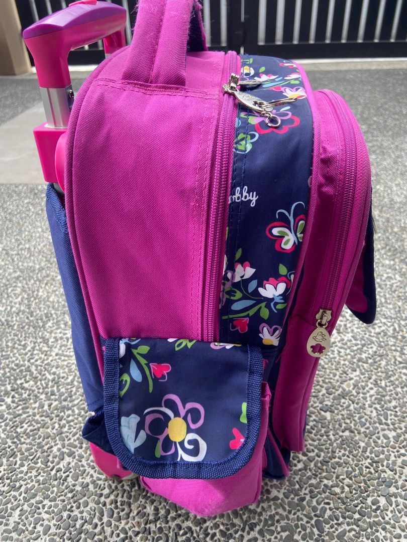 Robby Rabbit Trolly Bag (pink/purple) (Category: Babies & Kids Fashion) located in Las Pinas. Submitted by gepoy303 (Listing ID 1282424544, Image 3). Description: Robby Rabbit Trolly Bag - 12in (L) x 14in (W) x 7in (H, not yet expanded) - with side pocket, water tumbler pocket - cleaned, 8/10 condition - can be used for nursery to Grade 1, fits books and notebook Location: las pinas / BGC Thank you. .