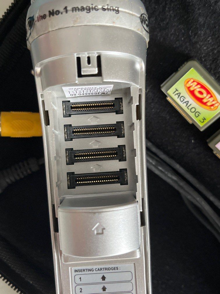 WOW! Magic Sing ED9000 with Duet Microphone & 2 song chips (Category: Other Home Appliances) located in Quezon City. Submitted by jp_ii (Listing ID 1282428737, Image 3). Description: Included: WOW! ED9000 main microphone, bag, Song List (with manual) & binder, adaptor, video extension cable, 2 song chips (Tagalog 3, Tagalog 4), Duet microphone With box Payment: Gcash, BPI.