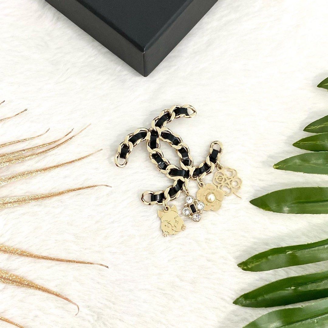 Chanel sales leather brooch