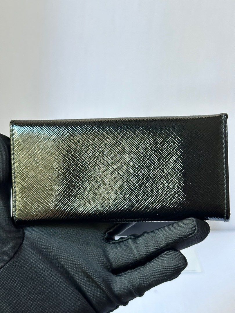 Authentic PRADA Key Holder (Category: Luxury Bags & Wallets) located in Santa Rosa. Submitted by brandieshoppe (Listing ID 1282734117, Image 3). Description: ✅ Authentic / Original Preloved ✅ From Japan Auction ✅ Moneyback Guaranteed If Proven Fake ✅ In Excellent Condition ✅ Message Us For More Details *Open Also for Layaway Terms.