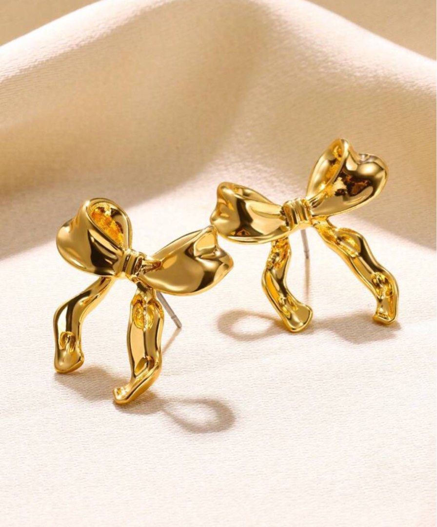 Gold new arrivals bow earrings