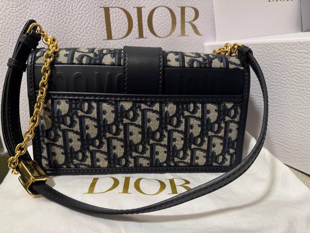 30 montaigne jacquard canvas clutch bag clearance