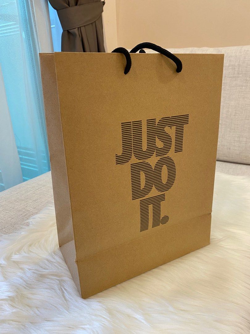 Nike shop paper bag Women s Fashion Activewear on Carousell
