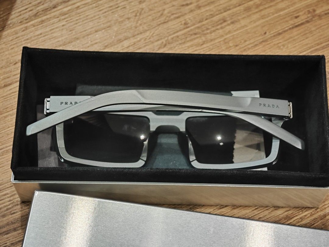 Prada aluminum frame best sale sunglasses
