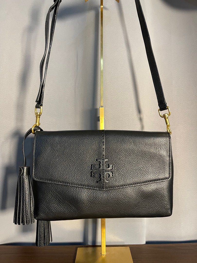 TORY BURCH MCGRAW (Category: Luxury Bags & Wallets) located in Mandaluyong City. Submitted by mr018 (Listing ID 1282801295, Image 1). Description: Preloved TORY BURCH MCGRAW for sale 🖤 100% Authentic YKK zipper With tag Like new, only used once No issues to mention, simply stored Inclusion: Dustbag, Crossbody strap & Tussel For only 7k! Pasig loc Meet up or deliver via lalamove/lbc.
