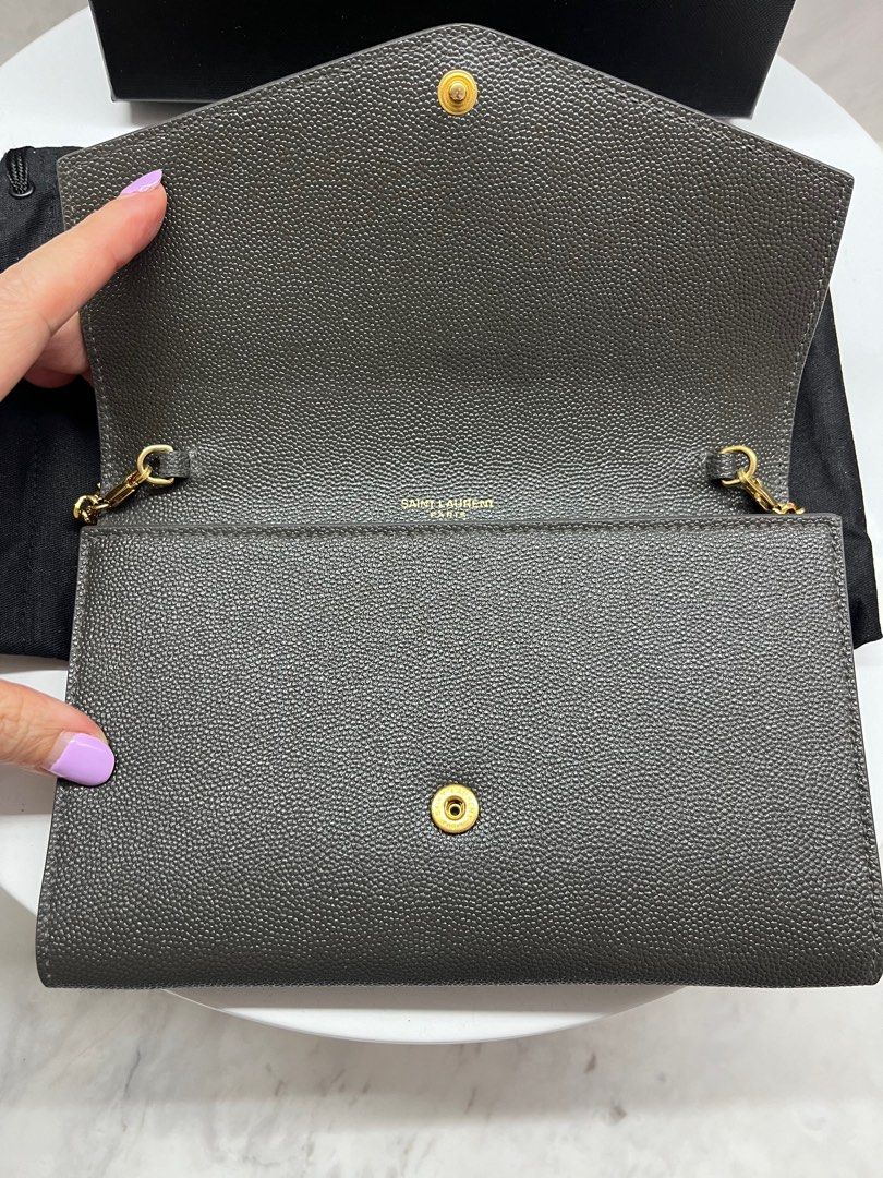 YSL envelope wallet on chain in classic grey. A unique size that