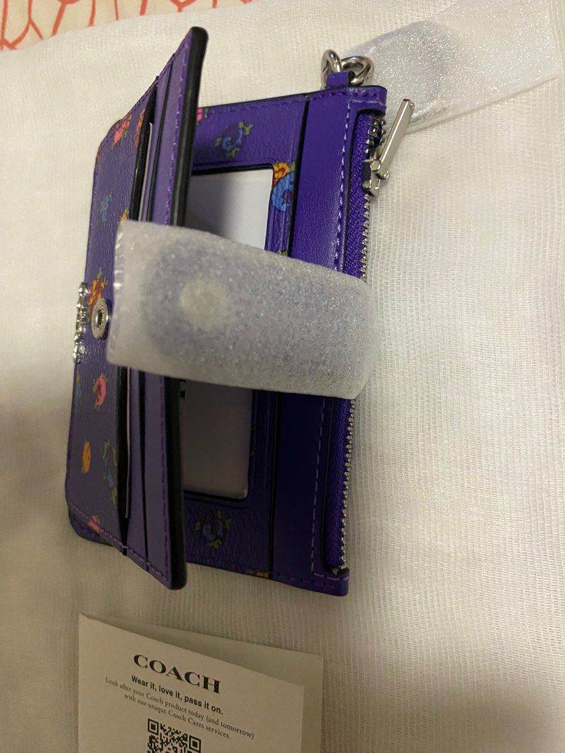 Coach (Category: Wallets & Card holders) located in Quezon City. Submitted by mrs_declutter (Listing ID 1276255767, Image 3). Description: Coach card case with zip compartment key ring ID window Back open pocket Purple with floral design From the USA.