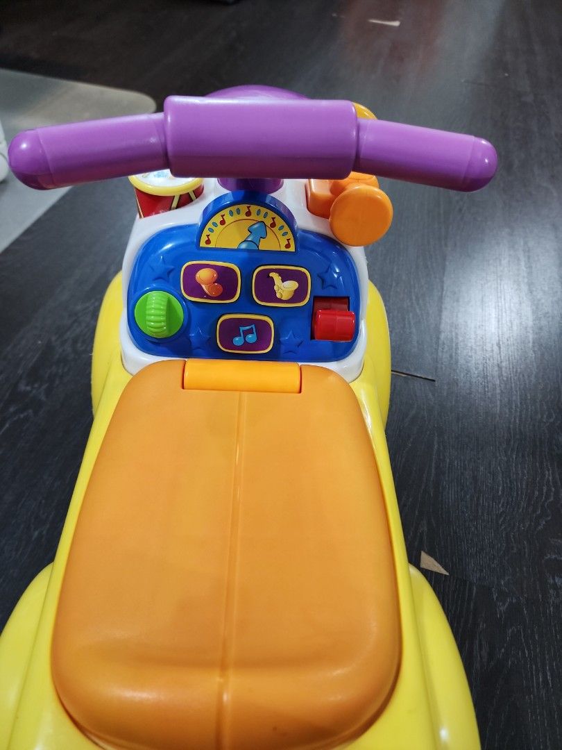 Fisher price motorcycle walker top