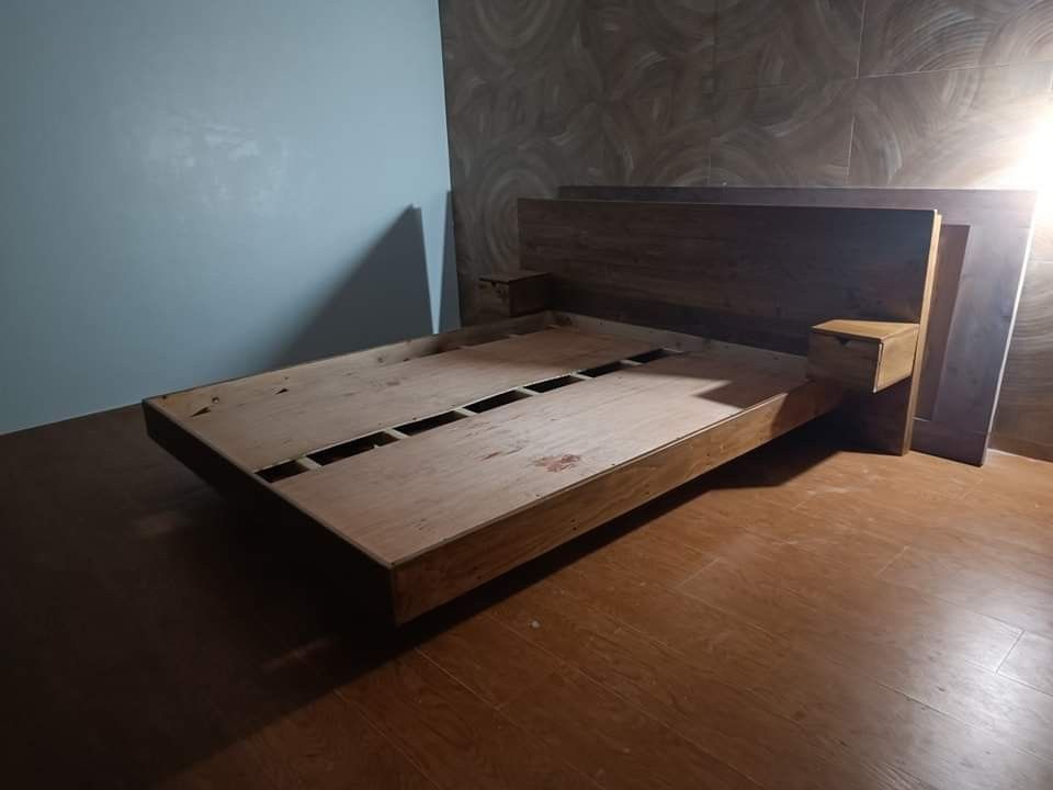FLOATING BED WITH SIDE TABLE (Category: Bed Frames & Mattresses) located in General Trias. Submitted by jameswoodlike (Listing ID 1276263567, Image 2). Description: "Life helps those who helps themselves" ☺️💪 BUCKLE UP! 2024 is coming!!!! 😁 Ginabi na sa pag install dto sa PLARIDEL QUEZON! Pero ayos lang mahalaga na install ng matibay at tama Ang mga order nten! Huling HIRIT Bago Ang pasko! SOLD and INSTALLED 🚚😁 ✅ FLOATING BED ✅ Queen Size Bed