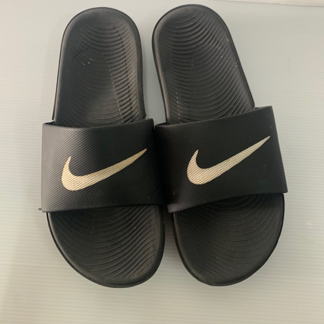 Nike slides gold tick sale