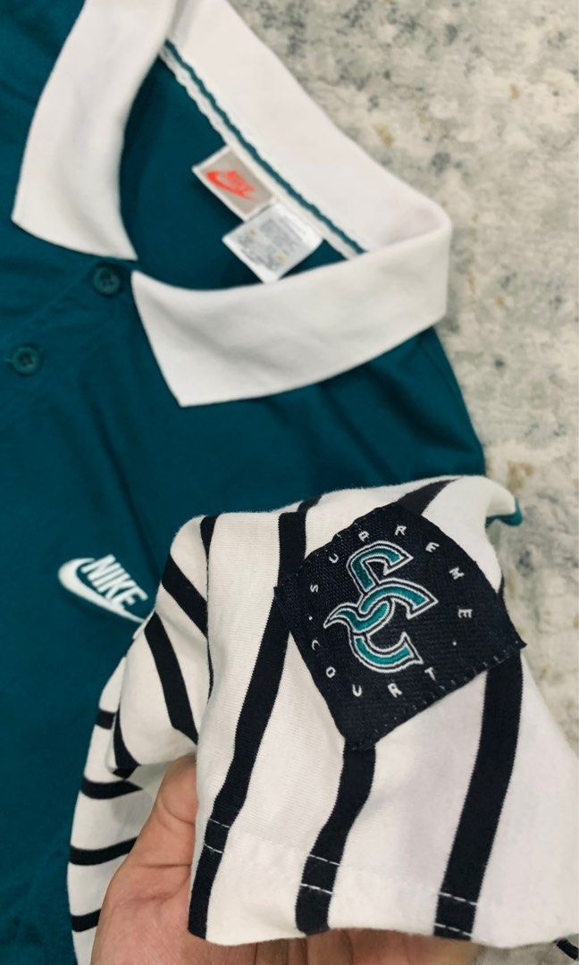 Nike supreme court polo store