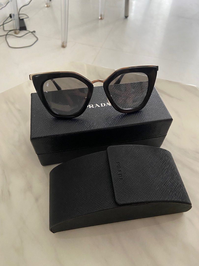 Prada sunglasses black hotsell and gold