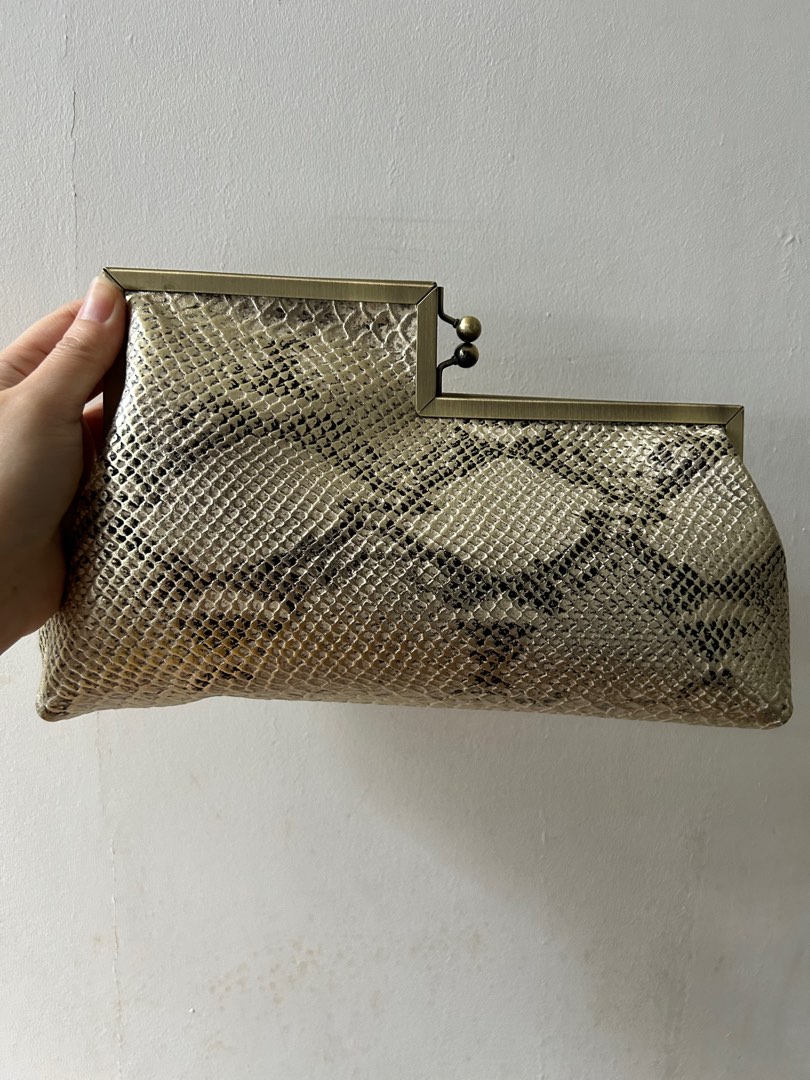 Gold snake print clutch bag outlet