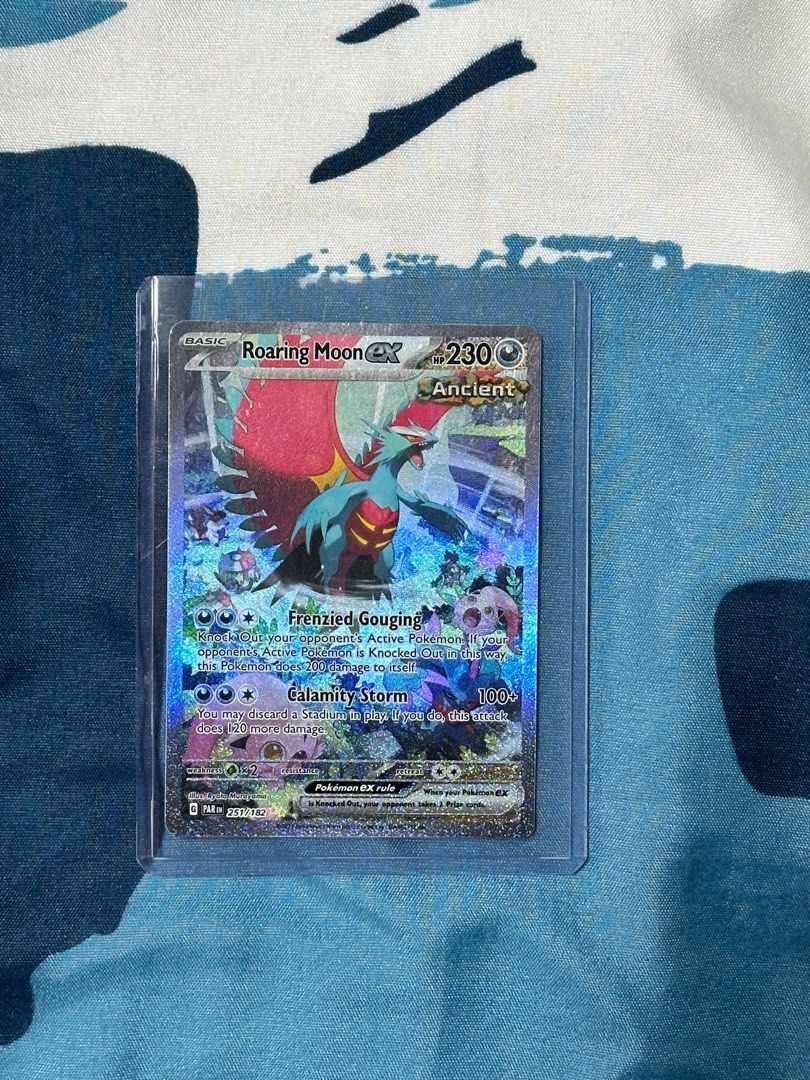 Roaring Moon Pokemon Card, Hobbies & Toys, Toys & Games on Carousell