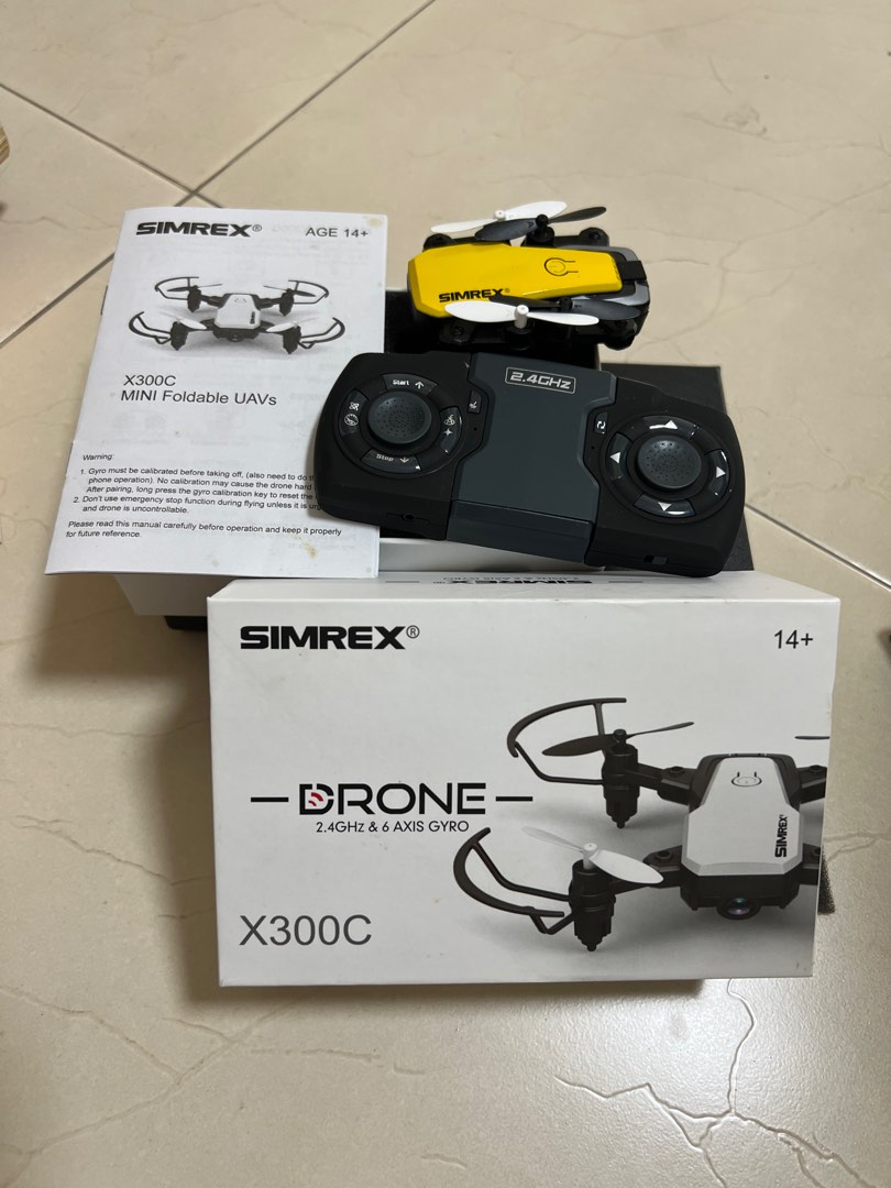 Simrex x300C mini foldable UAVS (drone), Photography, Drones on Carousell