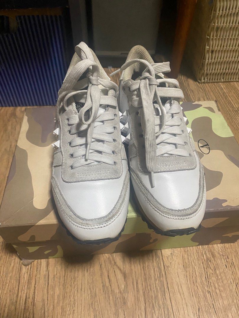 Valentino Sneakers (Category: Sneakers) located in Pasig City. Submitted by bauchell (Listing ID 1276198658, Image 1). Description: Well used sneakers. Been stored for a while. Price negotiable. Sold as is..