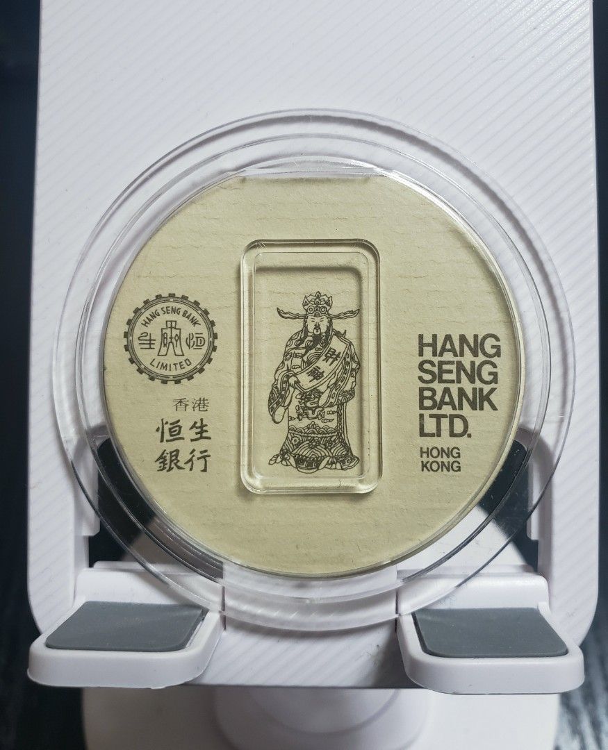 80年代絕版頭版恒生銀行財神金牌9999 Fine Gold 足金二錢= 7.4858 gm 恒生銀行經典舊銀行徽章連原裝圓形透明膠盒內附說明書Royal  Mint #