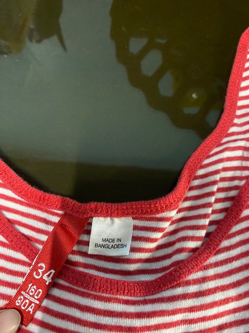 Divided by H&m sleeveless (Category: Sleeveless) located in Binan City. Submitted by casseyshoppe (Listing ID 1282820604, Image 3). Description: Im selling divided by h&m sleeveless for women Small-medium Stretchable Red and white Stripes In good condition Payment first thru gcash Shipping via j&t or lalamove at buyer’s expense.