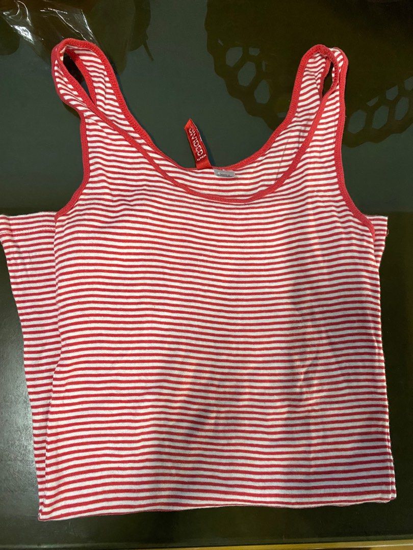 Divided by H&m sleeveless (Category: Sleeveless) located in Binan City. Submitted by casseyshoppe (Listing ID 1282820604, Image 1). Description: Im selling divided by h&m sleeveless for women Small-medium Stretchable Red and white Stripes In good condition Payment first thru gcash Shipping via j&t or lalamove at buyer’s expense.