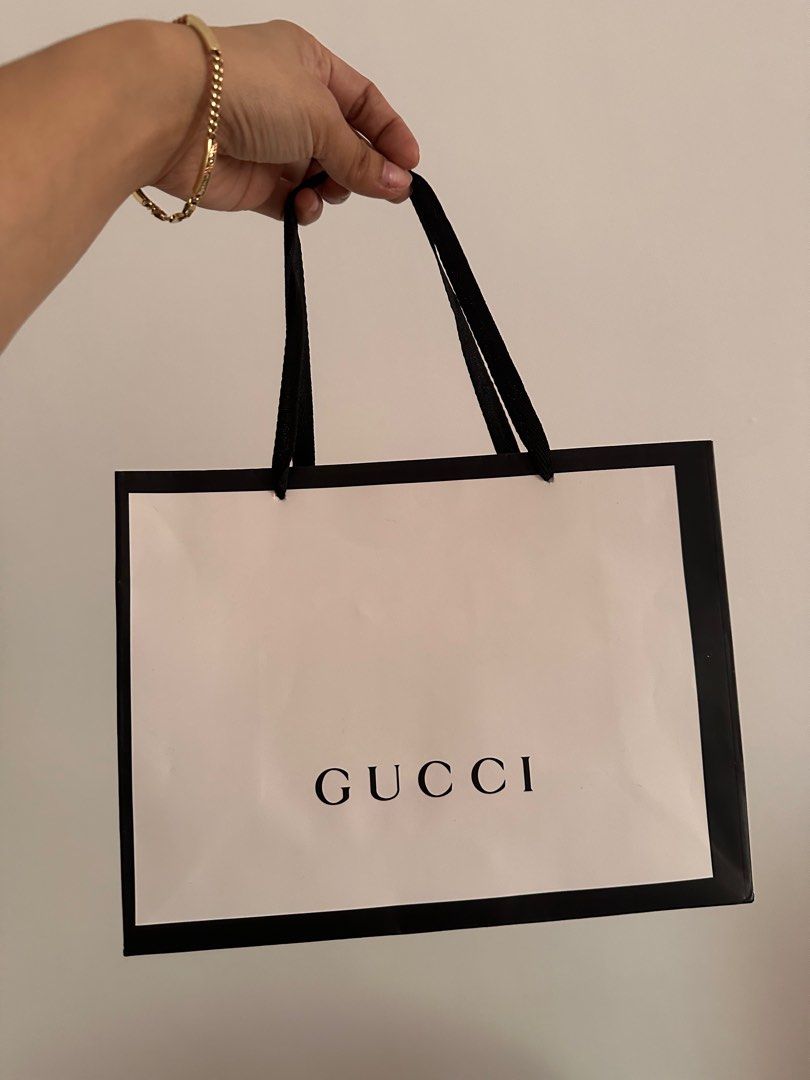 Gucci paperbag small authentic (Category: Luxury Bags & Wallets) located in Makati City. Submitted by jabbegailmendoza (Listing ID 1282826075, Image 1). Description: Very new Bought this at Gucci Greenbelt 4 Small ( bought sunglasses) Can fit wallet and sunglasses case.