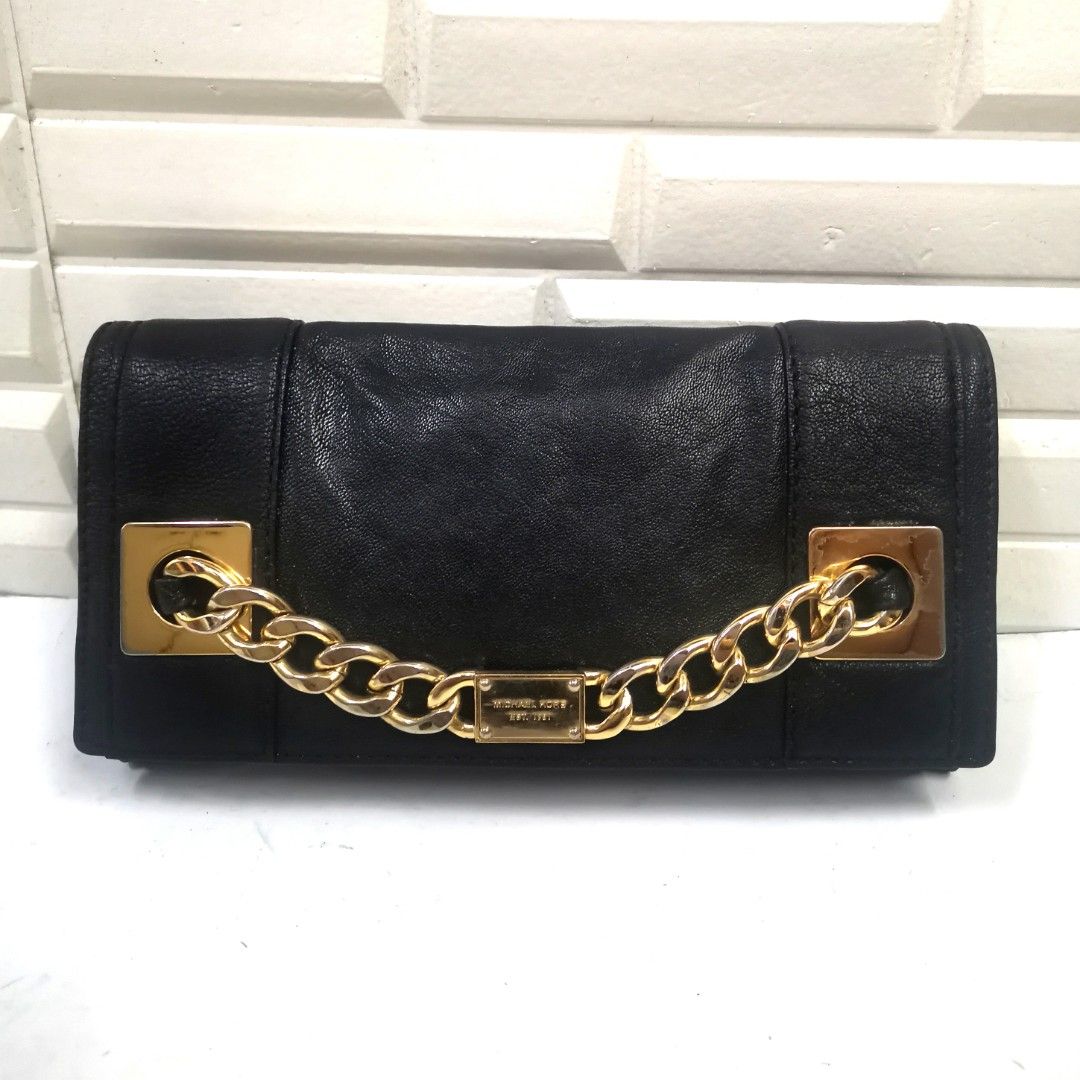 Michael kors black leather store purse with gold chain