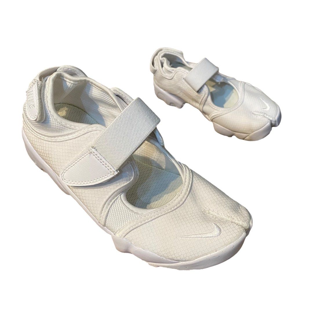 Nike Air Rift tabi sneakers (Category: Sneakers) located in Taguig. Submitted by ShopCesca (Listing ID 1282917488, Image 2). Description: Goretex water repellent material. Stays white longer!.