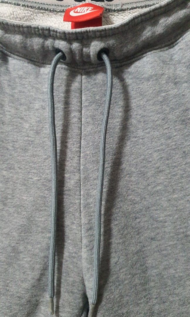 nike jogger pants red tag