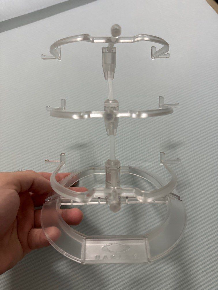Oakley sunglasses stand on sale
