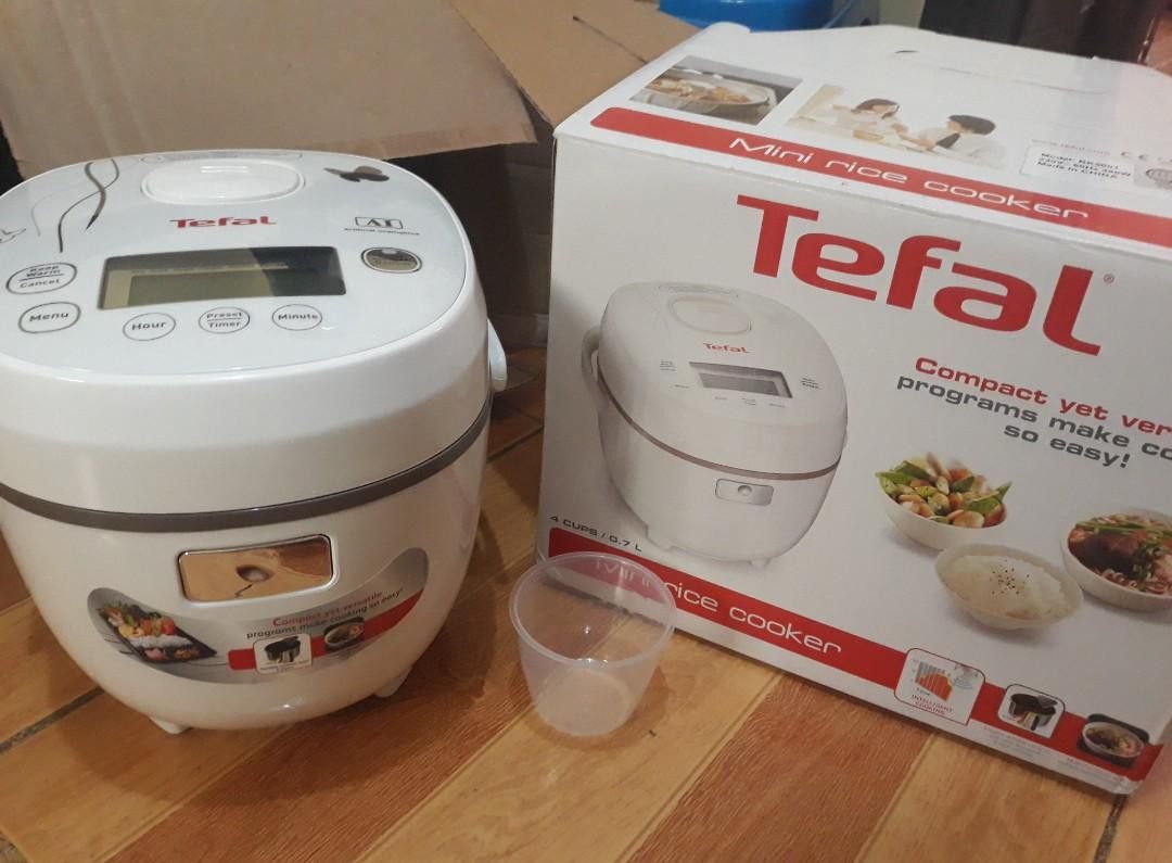 Tefal mini digital rice cooker Rk5001 (Category: Cookers) located in Rizal. Submitted by zaldybanan (Listing ID 1282975586, Image 3). Description: 420 watts 4 cups capacity expert in brown rice intelligent cooking 11 cooking functions with instant noodle program 2.0mm/5 layer ceramic pot with diamong shape interior coating, 24 hrs delayed start 24 hrs automatic keep warm, removable steam inner lid ; Accessories: rice & soup spoons, steam basket, 