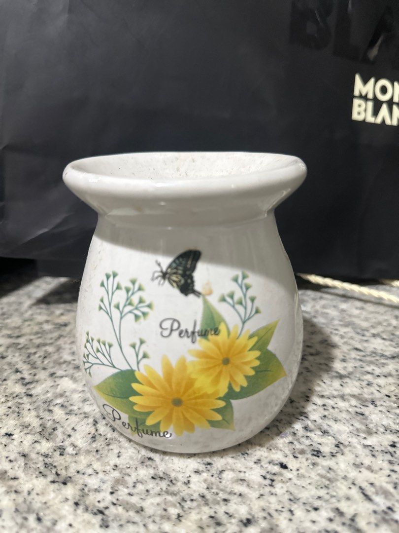 Ceramic Candle Holder (Category: Other Home Decor) located in Makati City. Submitted by primestuff (Listing ID 1283193223, Image 1). Description: Ceramic Candle Holder Displayed but never used. Like New. No chips. No issues. RFS- Decluttering MOP- GCash/BPI Delivery can be arranged via Lalamove/Grab. SF c/o buyer. Pls check my other listings. Thank you very much! .