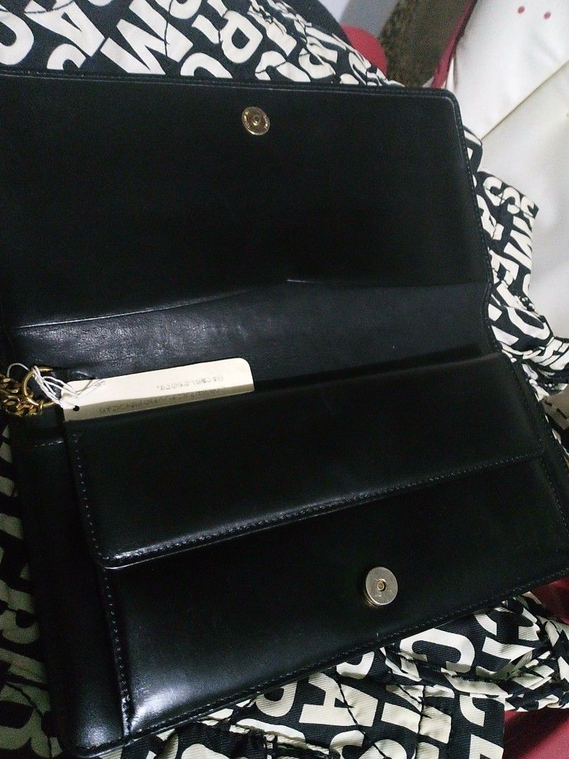 Nina Ricci long leather wallet (Category: Luxury Bags & Wallets) located in Paranaque City. Submitted by maikeelicious (Listing ID 1283283290, Image 1). Description: Nina Ricci leather wallet.