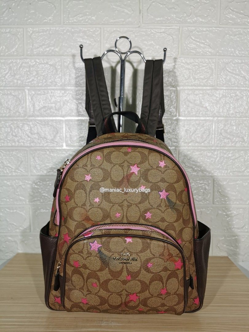 coach disco star backpack Rowan Satchel With Print top closure fabric lining Handles with 10 1/4 drop Outside zip pocket 12 3/4 (L) x 10 1/2 (H) x 5 1/2 (W) Style No. Pre-owned Coach Nwt Court Backpack