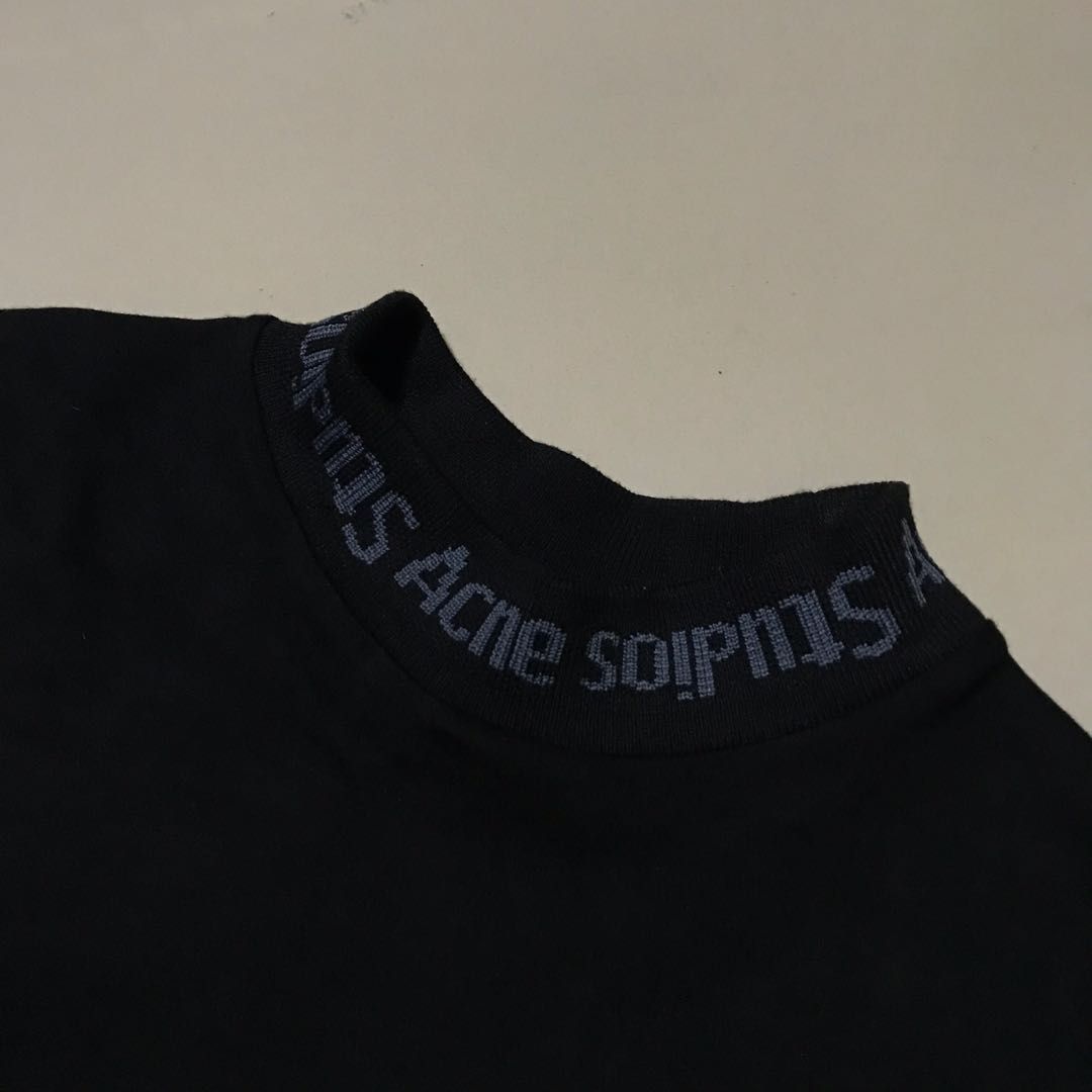 Acne Studios Mock Neck Black Tee (Category: Shirts) located in Pagbilao. Submitted by unit4302 (Listing ID 1276523970, Image 2). Description: Acne Studios Mock Neck Black Tee Excellent Condition Small No issue Measurements: Pit to pit - 19 inch Shoulder to hem - 24 inch.