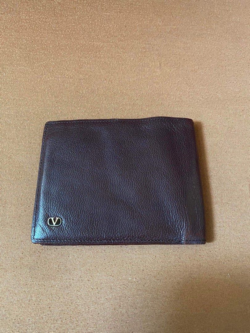 Authentic Valentino Garavani wallet (Category: Luxury Bags & Wallets) located in Cainta. Submitted by cherie0831 (Listing ID 1276470108, Image 3). Description: Color: Brown Guaranteed authentic.