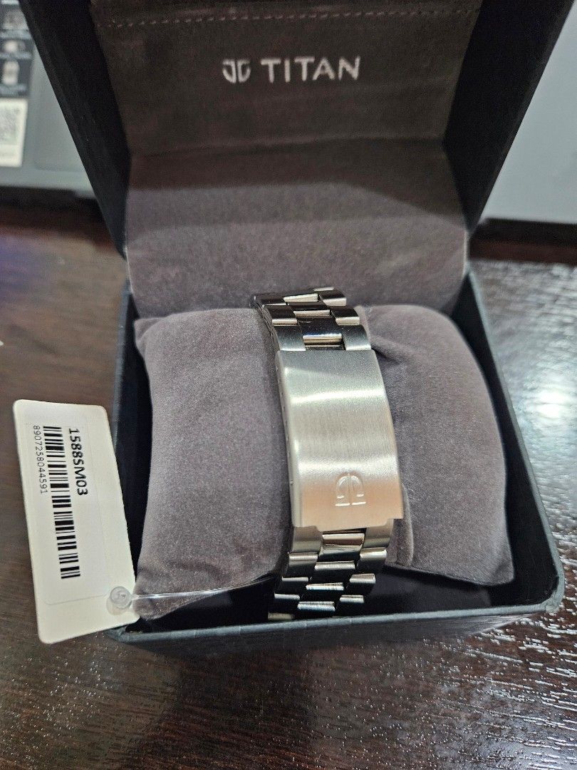 Titan watch deals 1588scb price