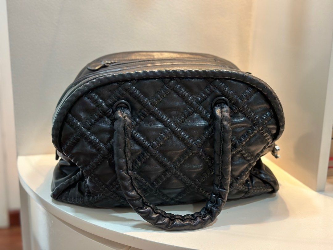 CHANEL Black Quilted Soft Leather Hidden Chain Bowler bag (Category: Luxury Bags & Wallets) located in Muntinlupa City. Submitted by macasanova (Listing ID 1276524938, Image 1). Description: This stylish bag is made from a soft leather and it’s an all-rounder. It looks brand new since I only used it once. It has a spacious interior lined with satin. It has a CC logo zipper pull. It comes with dustbag and authenticity card. RFS: for style upgrade.