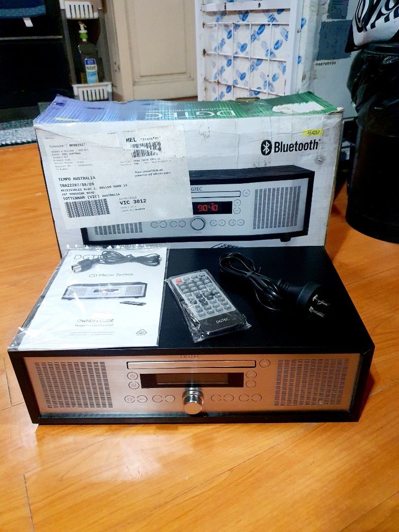 DGTEC BT Desk CD Micro Stereo System (Category: Portable Music Players) located in Caloocan City. Submitted by mack.bay (Listing ID 1276623113, Image 3). Description: DGTEC BT Desk CD Micro Stereo System (COMPLETE) Model No. DG-CDMC17 ALL-IN-ONE AUDIO PLAYER Legit, Original, not copy Color: Black Finished Woodn body Unit is Makinis na makinis. Bought in Australia. Stainless front LED Display, dimmable display 3x Ideal for room Classy decent Desig