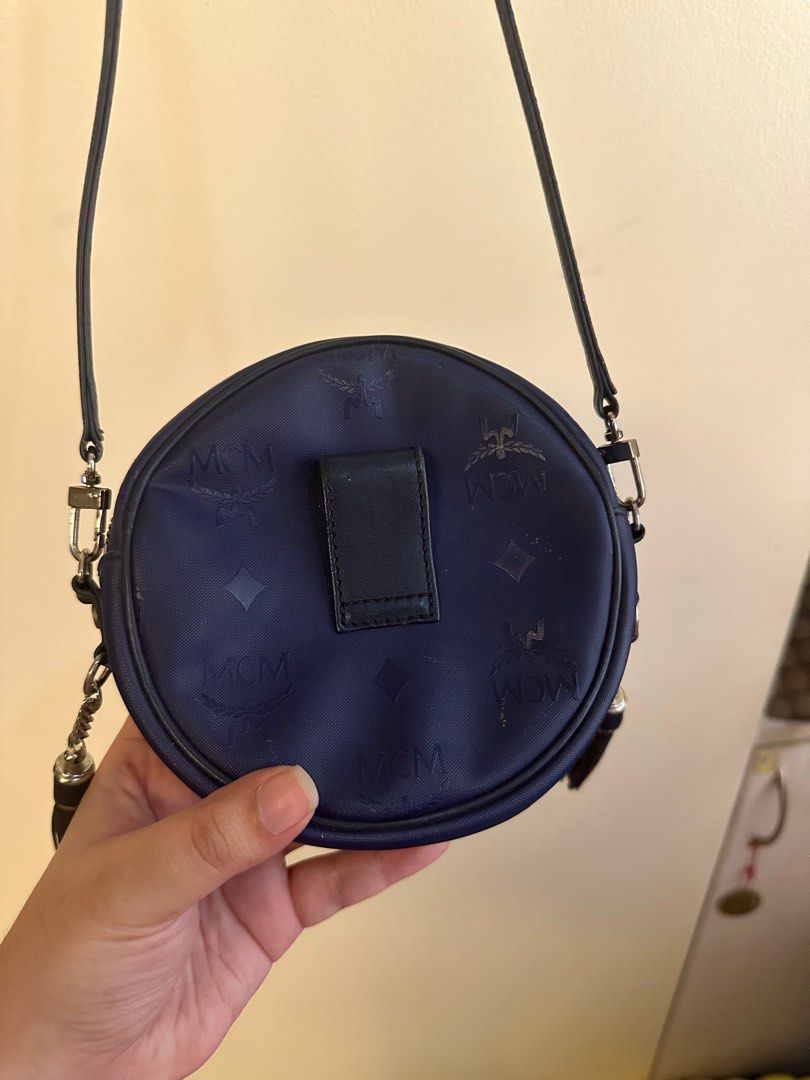 MCM 2-way micro bag (Category: Luxury Bags & Wallets) located in Quezon City. Submitted by angshopper (Listing ID 1276563628, Image 2). Description: -can be used as sling, crossbody or belt bag -with scratches on the hardware -can fit keys, lipstick and other essentials (not phone) -5.2 x 5.2 x 1.4 inches, 50” strap length (25” drop) .