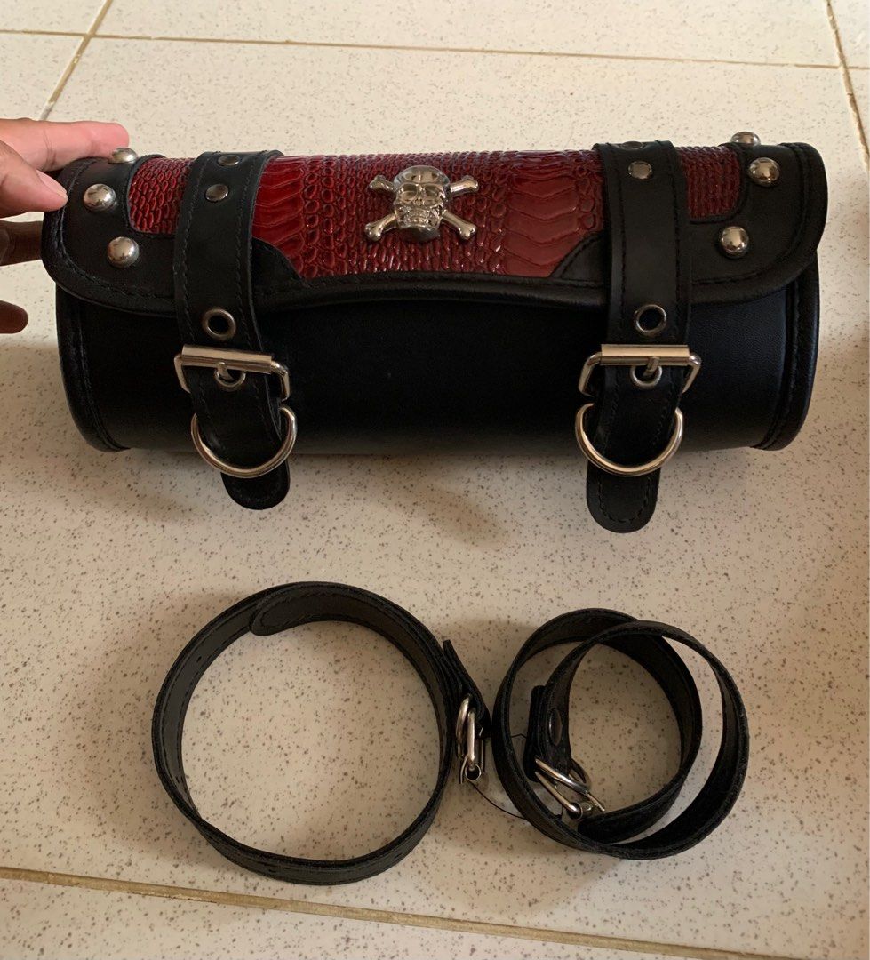 Motorcycle Tool Bag Red python pattern Skull concho / authentic (Category: Luxury Bags & Wallets) located in Naga. Submitted by thriftboss88 (Listing ID 1276598101, Image 2). Description: Motorcycle Tool Bag In brandnew condition Size Small Japan product Maganda sa mga naka scramble and cafe racer motor. 2k only.
