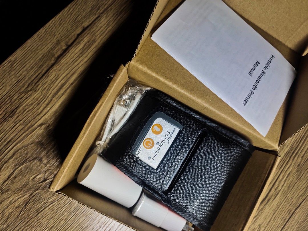 Portable Bluetooth Printer (Category: Printers, Scanners & Copiers) located in Quezon City. Submitted by mslen08 (Listing ID 1276637529, Image 1). Description: Brand new and never been opened bluetooth portable printer. RFS: Got as a gift. *spare item.