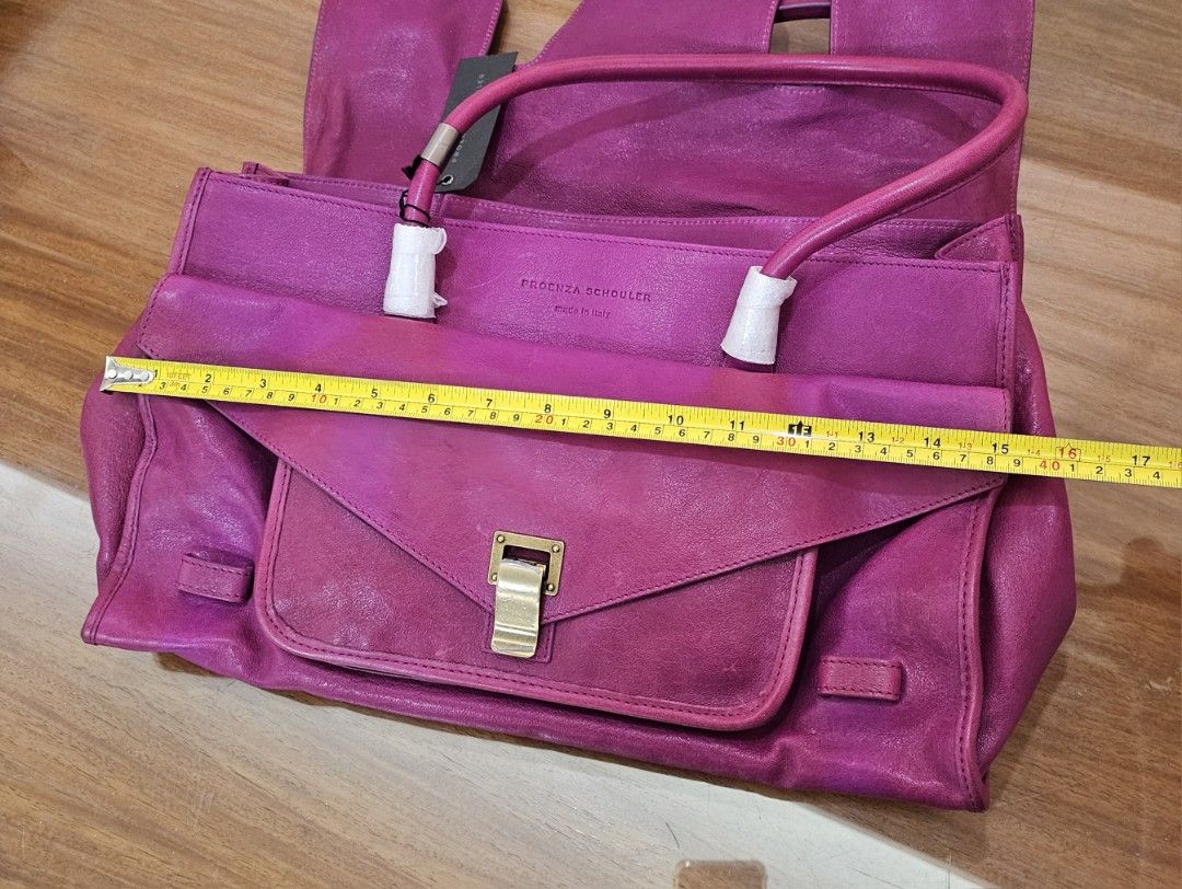 Proenza Schouler In Orchid (Category: Luxury Bags & Wallets) located in Del Monte. Submitted by lifestyleboutik (Listing ID 1276536992, Image 3). Description: Guaranteed orig Brandnew w/tag W/slight discoloration (see pic w/white line,oxidized leather Not obvious.