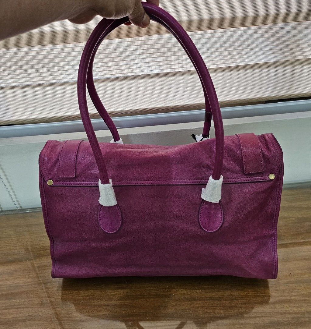 Proenza Schouler In Orchid (Category: Luxury Bags & Wallets) located in Del Monte. Submitted by lifestyleboutik (Listing ID 1276536992, Image 2). Description: Guaranteed orig Brandnew w/tag W/slight discoloration (see pic w/white line,oxidized leather Not obvious.