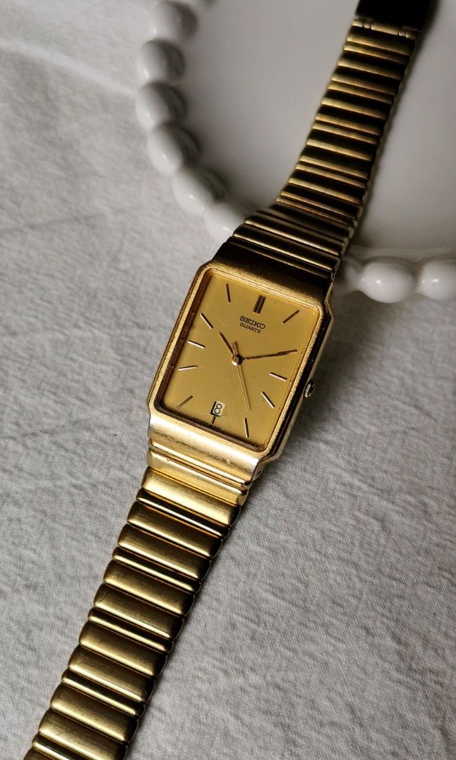Vintage Seiko Men Tank Rectangular Gold Tone Date luxury watch